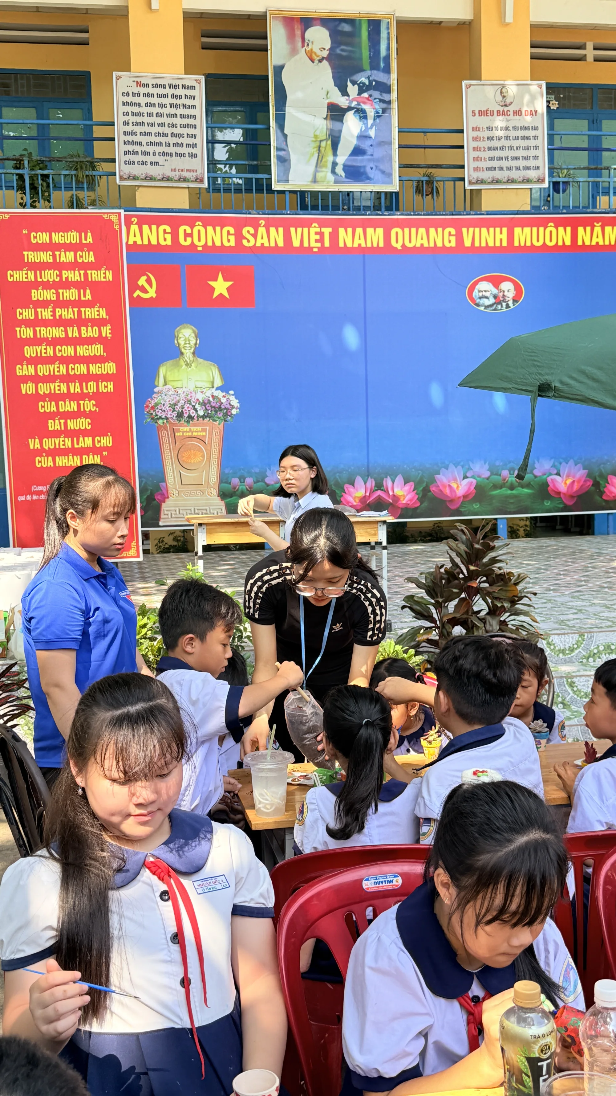 Plant For Change team supporting students at a school event